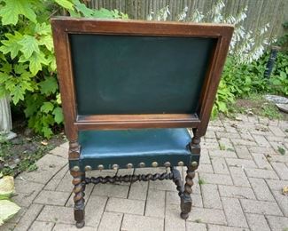 Green leather and barley twist wood armchair   225.00 wear on leather seat          37"h x 24"w x 26"d