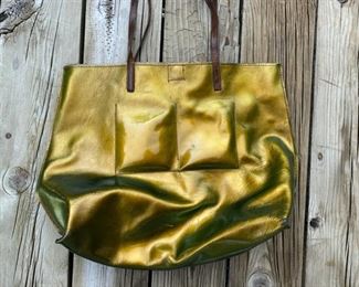 b. may      gold tone bag                                                          