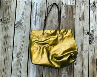 b. may      gold tone bag                                                          