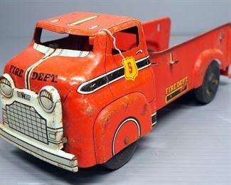 Structo Dump Truck, Buddy L Sand And Stone Dump Truck, And 2 Metal Fire Trucks