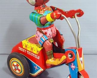 Vintage Tin Toys, Includes Wyandotte Hoky Poky Circus Clown Car, Yonezawa Tricky Tricycle Friction Toy, And Dept 56 Tin Monkey Elephant Teeter Totter