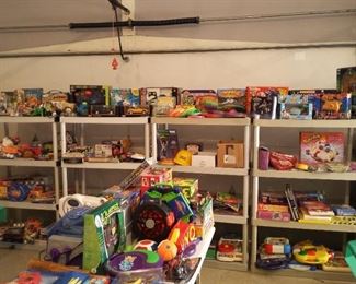 Shelves & Tables full of 1990s to 2010s Toys & Games many NIB!  Perfect for Holiday Gift Giving.  Access Toys thru Garage Entrance.