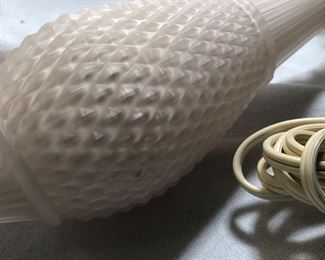 Pink opaque bedroom lamp.