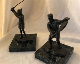 Heavy little statues.