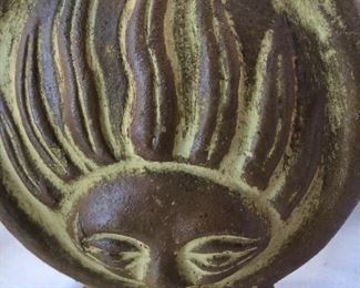 Terra cotta sun bottle.