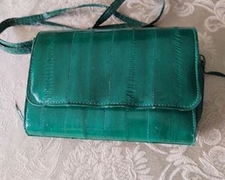 EEL SKIN PURSE SOME WARE AROUND STRAP $20.00