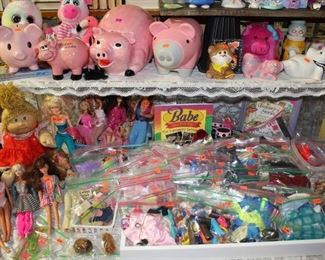 Lots of Barbie/Ken/Skipper etc. clothes.