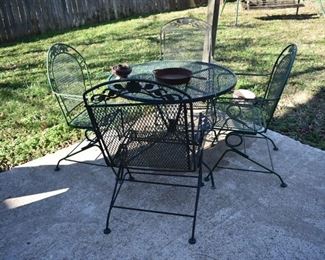 Wrought Iron Patio Set consisting of 4 Chairs and Table