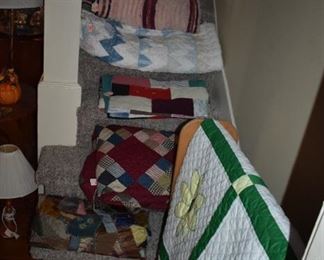 Gorgeous Quilts line the Stairway. 