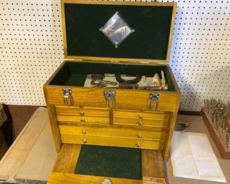Tool box with assorted knives and assorted precision measuring pieces