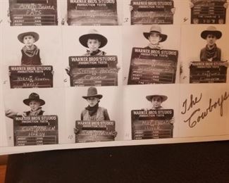 Western themed DVDs and "The Cowboys" picture