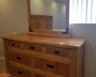 Matching dressers, one with mirror.