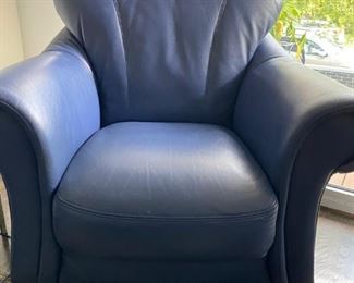 Matching leather arm chair. Have two. $250 each.