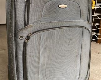 Samsonite suitcase.  Outside shows wear but inside in great condition. $30.