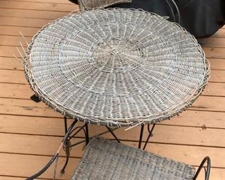 Woven bistro set with two chairs and table. $75 for the set.