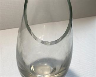 Heavy contemporary glass vase. Two small chips at top not noticeable when flowers inside.  $20.