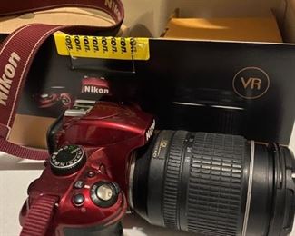 Nikon D3200 red camera body, with AF-S DX Nikkor 18-55mm f/3.5-5.6G VR lens, strap, lens cap, user's manual,  software CD-ROM, rechargeable battery and charger, and original box.  $400 for everything.