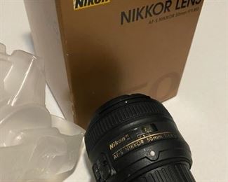 Nikkor AF-S 50 mm f/1.8G lens  with front and back caps and original box. $100.