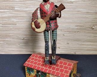 Jazzbo Jim Tin Litho Wind Up Toy