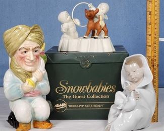 NAO Lladro baby, Snowbabies Rudolph gets ready and Sinbad Toby Jug