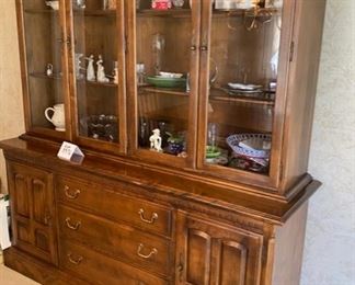 Lot 3376 Asking $595.00. Ethan Allen Lit China Cabinet with 4 Glass Doors, 3 Drawers and 2 Cabinets for Storage	66" W x 76" H x 19" D	