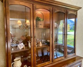 Lot 3376 Asking $595.00. Ethan Allen Lit China Cabinet with 4 Glass Doors, 3 Drawers and 2 Cabinets for Storage	66" W x 76" H x 19" D	