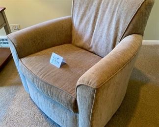 Lot 3379  $325.00. Nice Flexsteel Kingman Upholstered Swivel Rocker Chair in Neutral Fabric retails for $750.00 	32.5" to Back of Chair, 32" W Arm to Arm, 22" W x 22" D x 18" H Seat.	 This is an exceptional rocker and swivel chair in a terrific fabric.  At half-price of $162.50 for a $750 chair that will go with anything, anywhere, it's a bargain beyond belief.  If you have ever owned a flexsteel piece of furniture, you know how solidly they are crafted, and this chair is no exception.  I couldn't get a photo to look good, I think because the lighting was playing tricks.  