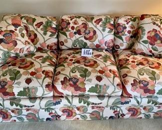 Lot 3388  $495.00. Henredon Sofa. Colors are Green, Coral, Navy, and Deeper Red. Extremely Comfortable Down  This sofa should have sold already - it's a steal for a like-new Henredon Sofa and this is not your mother's floral sofa - the style is hip and modern and if you pair it with a couple chairs in any of the colors - well, you've got a totally designer room!   Cushions are 45% Duck Down.	Sofa: 80" L x 35" D x 17" H to seat	Buy this now - at half price!!