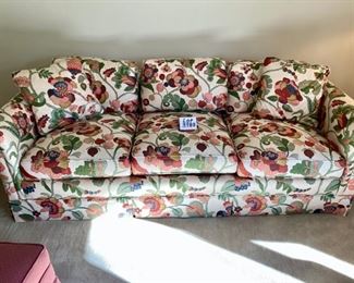 Lot 3388  $495.00. Henredon Sofa. Colors are Green, Coral, Navy, and Deeper Red. Extremely Comfortable Down  This sofa should have sold already - it's a steal for a like-new Henredon Sofa and this is not your mother's floral sofa - the style is hip and modern and if you pair it with a couple of chairs in any of the colors or even some solid color fun throw pillows - well, you've got a totally designer room!   Cushions are 45% Duck Down.	Sofa: 80" L x 35" D x 17" H to seat	Buy this now - at half price!!