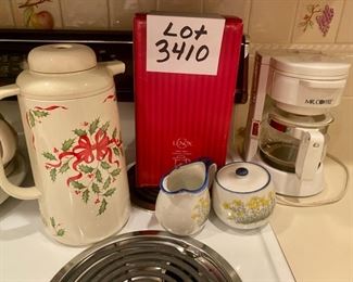 Lot 3410. $25.00. Mr. Coffee (cute little 4 cup coffee maker, great condition), a sweet stoneware creamer & sugar bowl, and Last, a Lenox Holiday Thermal Carafe in orig. box, looks to be in superb condition and does not appear to have been used.