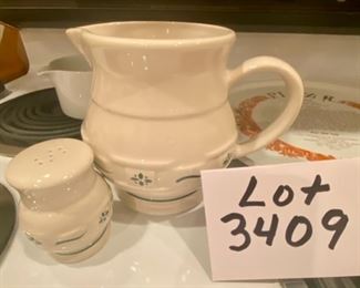 Lot 3409. $24.00 Dansk White Creamer - such a functional piece!, Longaberger Pottery Pitcher, and Longaberger Sugar or Salt Shaker, and last, a Pizza Cooking Plate by Shefford.  Has the recipe for pizza dough on the plate, some wording starting to fade.  Fun lot!