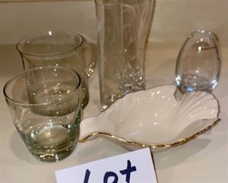 Lot 3411. $28.00. 5 pc. random lot:  1) Beautiful 9" crystal Tulip "Innocence" Vase, etched, by Lenox, with their watermark on bottom.  2). Lenox Candy or Nut Dish in the shape of a bird. 7-3/4" x 5" w x 2" tall - So unique!  3) 7" Bud vase, floral etching, 4) Cool crystal bud vase 4-1'/2" marked "Made in Poland" and this little vase is really sharp, perfect for teacher gift, and 5) Old fashion glass, signed on bottom but not legible to my pathetic eyesight.  The glass mug is not for sale - we found a chip on the rim.   