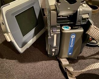 Lot 3419  $120.00. Sony Digital 8 Video Camera, Model DCR-TRV730 w/ 500X Digital Zoom. Includes Original Manual, 2 Batteries, Sony Memory Stick and LTX Series Cameral Bag by Tamrac. Still looking for Battery Charger and Remote. 