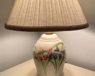 Lot 3448.  $20.00 Small table or dresser lamp, pottery with Iris design.