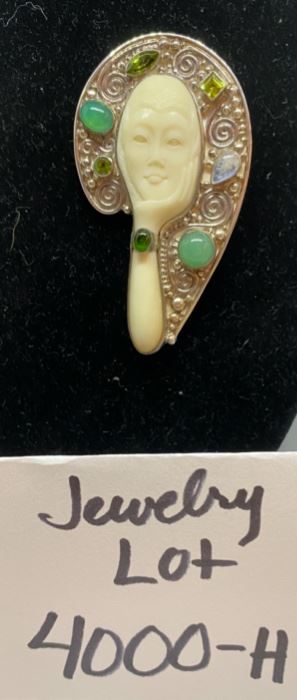 Jewelry Lot 4000-H $110.00. Beautiful SAJEN Sterling Silver Pin or Pendant w/7 Semi-Precious Stones surrounding a White Moon Face.  A hand is holding face.  2.75"x1.75" Super Nice Pin - a Conversation Piece that you'll love wearing.  SH