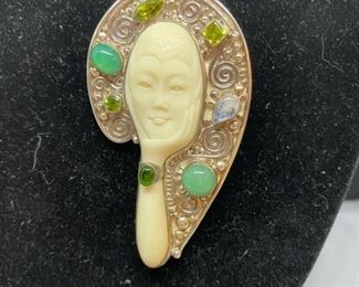 Jewelry Lot 4000-H $110.00. Beautiful SAJEN Sterling Silver Pin or Pendant w/7 Semi-Precious Stones surrounding a White Moon Face.  A hand is holding face.  2.75"x1.75" Super Nice Pin - a Conversation Piece that you'll love wearing.  SH