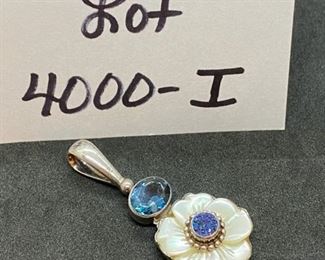 Jewelry Lot 4000-I $75.00. Two Lovely Sterling Silver SAJEN pendants.  One is Mother of Pearl Floral with blue Stone in Center and atop the flower.  Second is Another Pendant with Purple and Turquoise Stone and Amethyst stone above the major stone.   SH