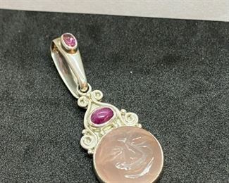 ewelry Lot 4000-J $50.00  Two SAJEN Sterling Silver Pendants:  1.  3" Blue Stone with swirls and 2 Stones above the large one., and 2.  Rose quartz carved moon goddess face - with two amethyst stones above.  SH