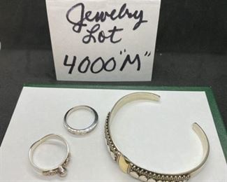 Jewelry Lot 4000-M. $65.00. Sterling Silver Bracelet Cuff with 18K gold in Center, and 2 rings - one is marked 925 and the other is not, but surely looks it.  The cuff is marked 18k and 925 on the inside.