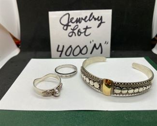 Jewelry Lot 4000-M. $65.00. Sterling Silver Bracelet Cuff with 18K gold in Center, and 2 rings - one is marked 925 and the other is not, but surely looks it.  The cuff is marked 18k and 925 on the inside.