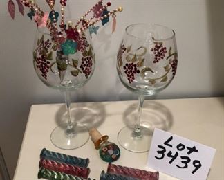 Lot 3439. $35.00. Set of 6 knife rests (Cristal from Hungary), Pair of handpainted wine glasses, whimsical wine stopper, glass wine stopper		