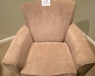 Lot 3379  $325.00. Nice Flexsteel Kingman Upholstered Swivel Rocker Chair in Neutral Fabric retails for $750.00 	32.5" to Back of Chair, 32" W Arm to Arm, 22" W x 22" D x 18" H Seat.	 This is an exceptional rocker and swivel chair in a terrific fabric.  At half-price of $162.50 for a $750 chair that will go with anything, anywhere, it's a bargain beyond belief.  If you have ever owned a flexsteel piece of furniture, you know how solidly they are crafted, and this chair is no exception.  I couldn't get a photo to look good, I think because the lighting was playing tricks.  