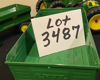 Lot 3487. $95.00. 6 Pc. Vintage John Deere Tractors & Wagons H6862, Plow and Disco Cultivator.  Wheels & Tires good shape. Paint on the newer tractor is excellent