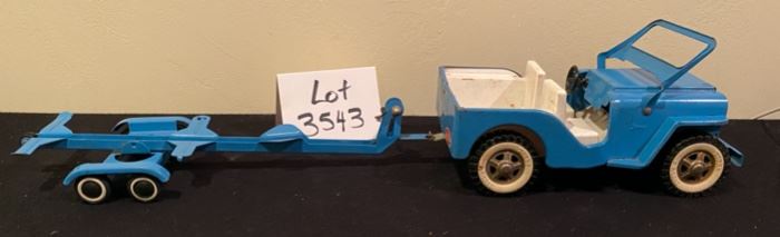 Lot 3543 $80.00 5 Pc Tonka Collection:  1. Tonka Blue Jeep Wrangler. 2. Tonka Matching Boat Trailer (real nice)  3.  Vintage Tonka Dump Truck. (good restoring project) 4.  Tonka Red VW Beetle (cute) 5.  Tonka Orange Dune Buggy