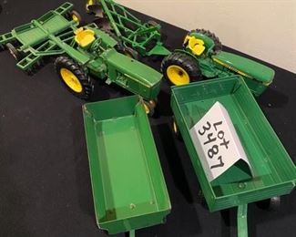 Lot 3487.$95.00  6 Pc. lot of Vintage John Deere Tractors & Wagons H6862, Plow and Disco Cultivator.  Wheels & Tires good shape. Paint on the newer tractor is excellent