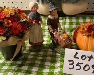 Lot 3509.  $50.00. Ceramic Pumpkin w/flowers, Bethany Lowe Designs Pilgrim 8" pair (were $85 new each), Potted Fall Floral, Scarecrow 29"tall. 