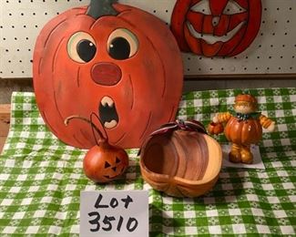 Lot 3510.  $35.00 5 pc. lot of Halloween decor: Metal Pumpkin Decor (14"tx13"w), Pumpkin gourd, Pumpkin boy, stained glass pumpkin (7"dia), carved apple bowl (6x6). 
