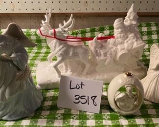 Lot 3518. $45.00. Musical Wind-up Ceramic Santa & Sleigh, Musical Angel (green and blue), Musical Angel (white), Holy Family votive