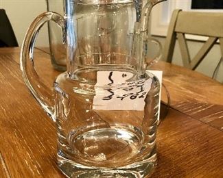Lot 3482.  $70.00. Tiffany & Co. Glass Pitcher, Glass mug (not for sale, chip found on lip), Pitcher and drinking glass (also called a Night Set) from Romania,  and three cordials.  