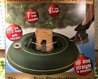 Lot 3553. $40.00. Krinner's Christmas Tree Genie - the EASY tree "Standsation".  The tree will stand up and straight in seconds.  Holds 1-1/2 gallons of water, up to a 7" in diameter tree and up to 9' tall.  Williams -Sonoma sells this for $80.00.  